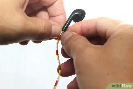 Image titled Make Tangle Free Headphones with Embroidery Floss Step 10