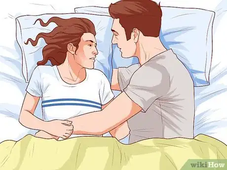 Image titled Avoid Trapping Your Arm While Snuggling in Bed Step 8