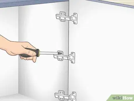 Image titled Fix a Cabinet Door Hinge Step 5