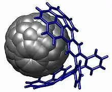 An example of molecular tweezers binding a fullerene