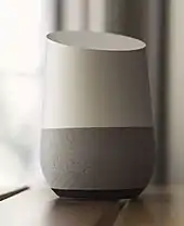 The Google Home smart speaker idle on a table