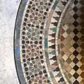 Zellij paving around the fountain of the Al-Attarine Madrasa in Fez